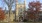 a large brick building with trees in front of it