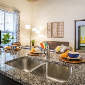 All the comforts of luxury living a kitchen with a large counter